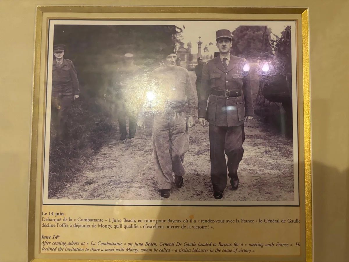 Historic photograph of General de Gaulle landing at Juno Beach on June 14, 1944