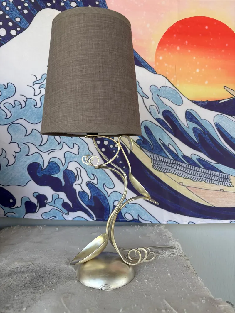 Handcrafted artistic lamp with sculpted metal base by Benjamin