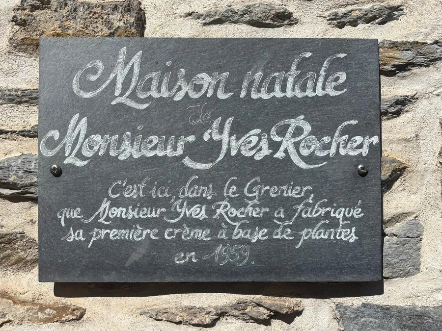 Slate plaque marking the birthplace of Yves Rocher